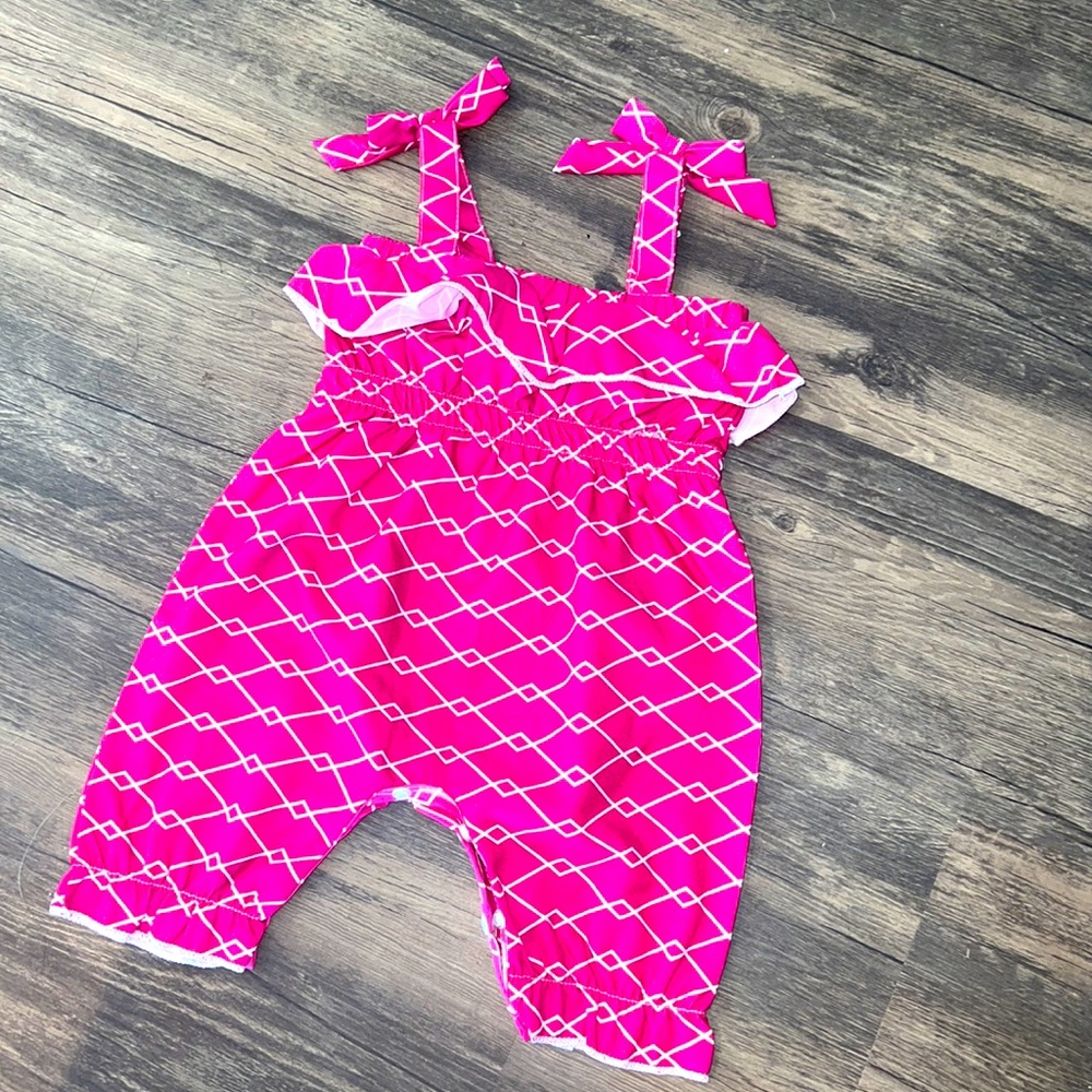 6-9 month baby jumper with ruffles and button bottom for easy diaper changes !